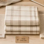 Plaid coton bio en coton bio sur table, tissage et matière